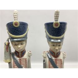 Two Lladro figures from the Solider Set, comprising At Attention no 5405 and Flagbearer no 5407, both with original boxes, H31cm 