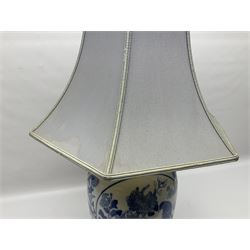 Chinese blue and white table lamp of baluster form, decorated with birds and floral displays, on hardwood base with shade, H78cm