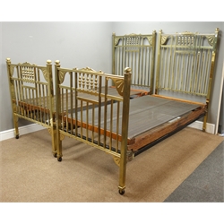  Pair Edwardian brass 3' single bedsteads, turned spindle pediments with decorated spandrels, sprung bases, H151cm  