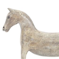 Carved Folk Art wooden horse, with glass eyes, H33cm