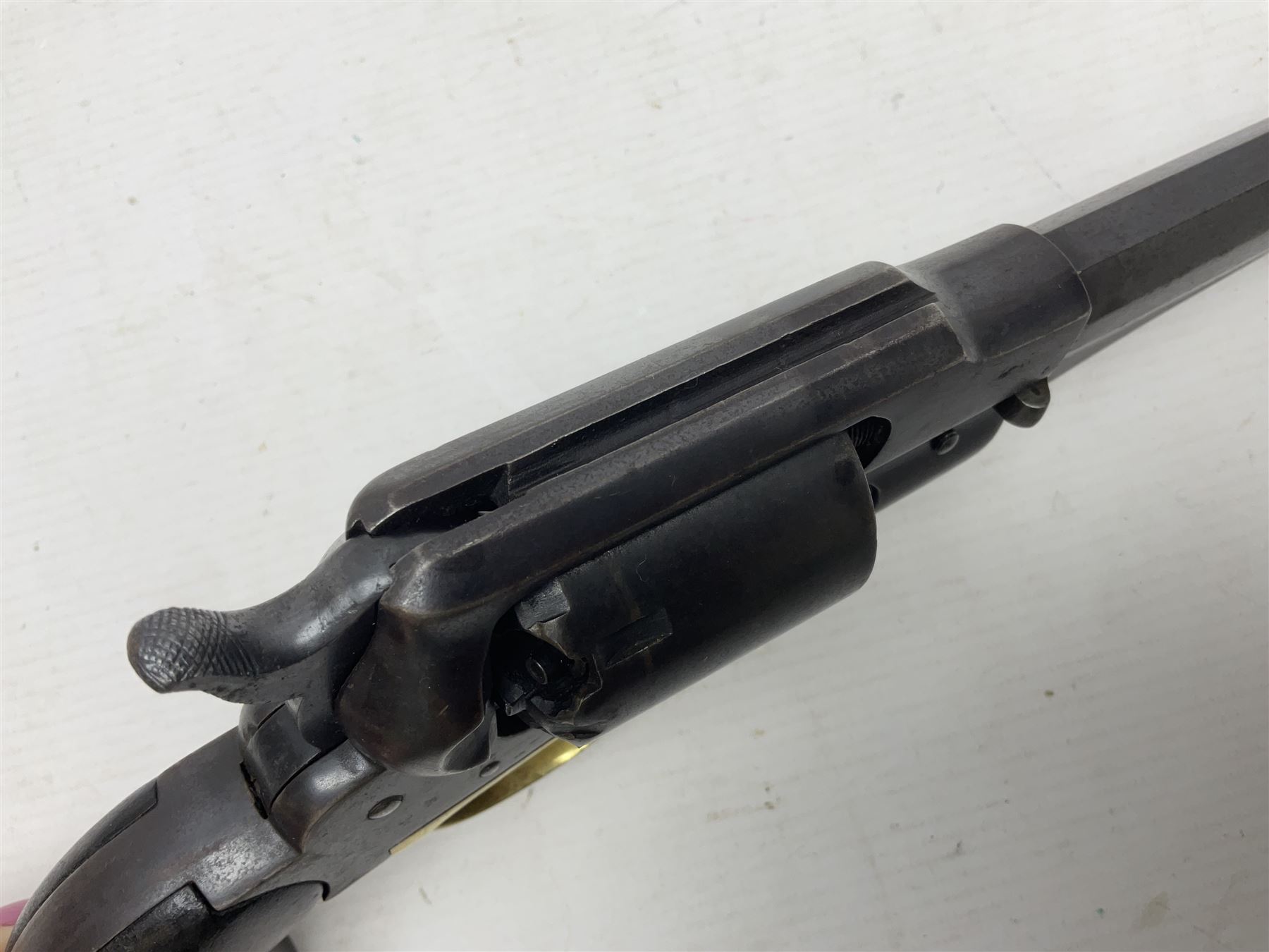 Unmarked Spencer & Rogers type Remington style .44 cal. six-shot percussion revolver, 20cm octagonal barrel with loading lever under, brass trigger guard and two-piece wooden grip L37cm overall; together with a framed watercolour by Alan J. Gray dated 2009 entitled 'The Remington .44 Calibre 1861 Navy Revolver'  19 x 42cm (2)