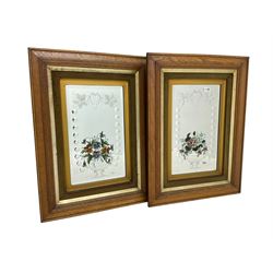 Pair of early 20th century wall mirrors, etched and bevelled plates painted with flowers, in moulded oak frames