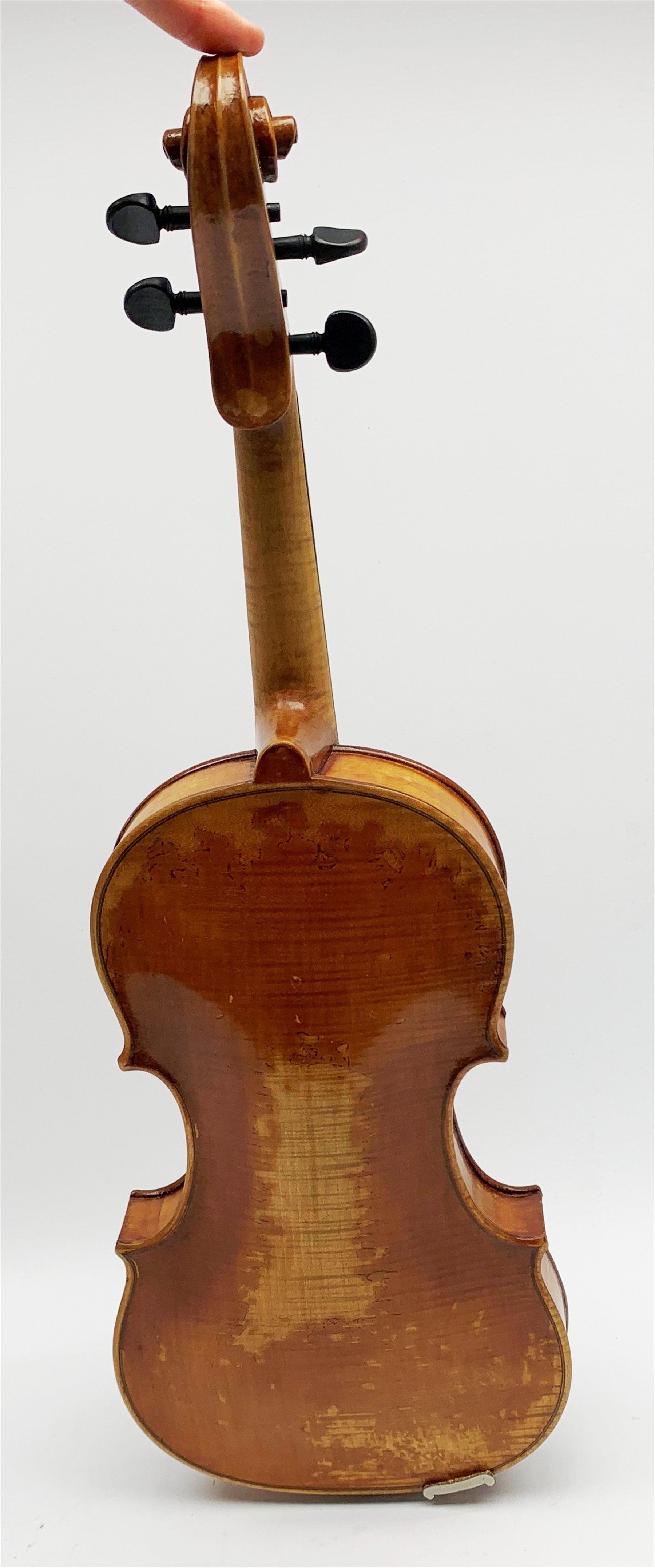  Late 19th century violin with 36cm maple back and spruce top, bears label 'Copy George Klotz Made in 1747', L59cm overall, in ebonised wooden carrying case with two bows  