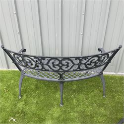 Cast aluminium garden table, and four curved bench seats, with rotating table top plate - THIS LOT IS TO BE COLLECTED BY APPOINTMENT FROM DUGGLEBY STORAGE, GREAT HILL, EASTFIELD, SCARBOROUGH, YO11 3TX