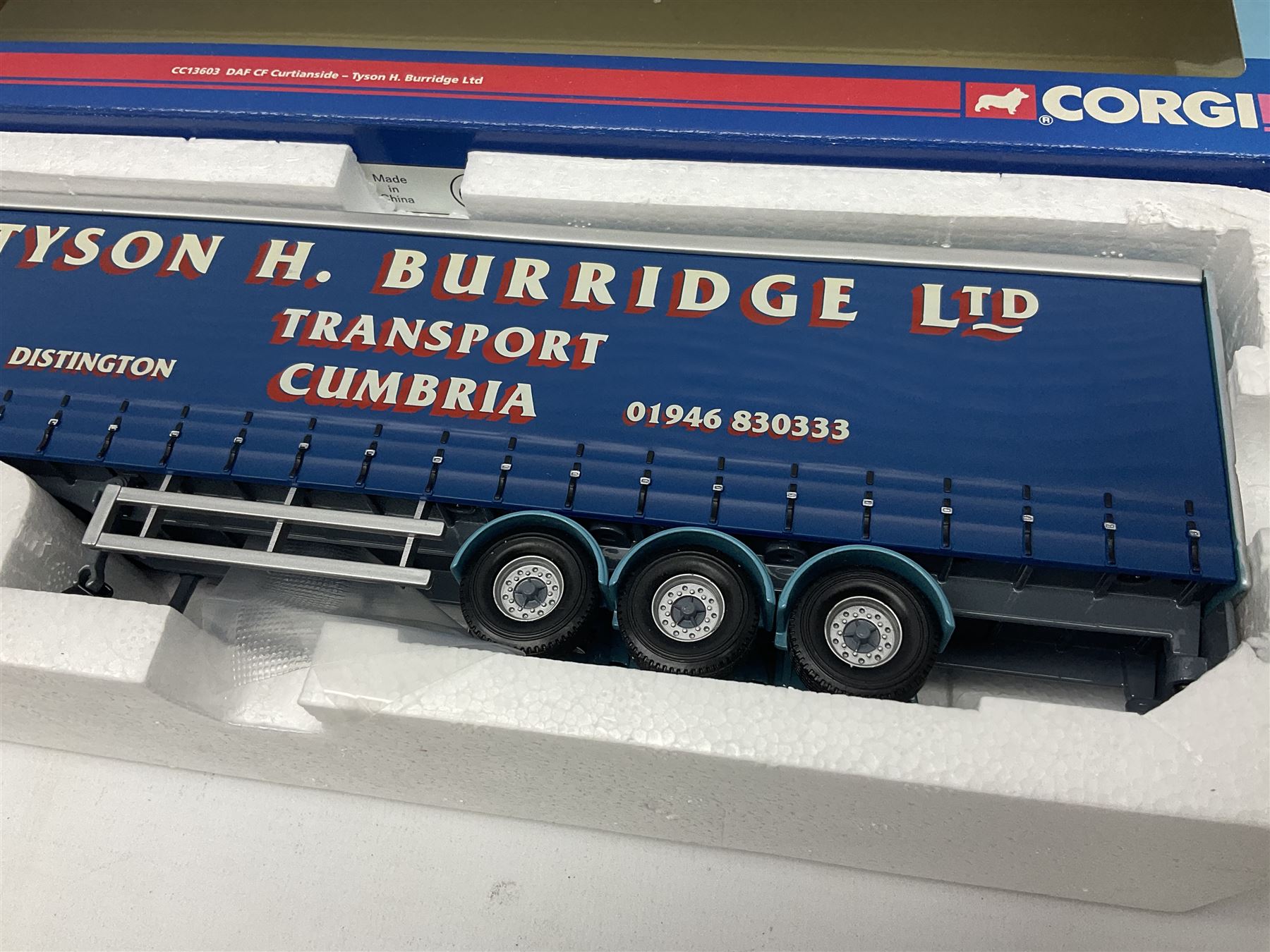 Corgi - three limited edition Hauliers of Renown lorries; CC13231 DAF XF Curtainside James Irlam & Sons Ltd; CC13420 MAN TGA Curtainside Woody's Express; and CC13603 DAF CF Curtainside Tyson H. H. Burridge Ltd; all boxed (3)