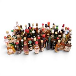 Collection of miniature alcohol, including Bowmore single malt whisky, Dimple whisky, Glen Grant 10 year old whisky, Southern comfort, etc 
