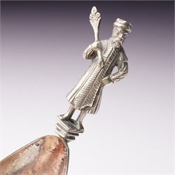 19th century Dutch silver spoon with hammered ovoid bowl, the reverse with a coat of arms, the stem formed as a standing figure after a 17th century design L13cm