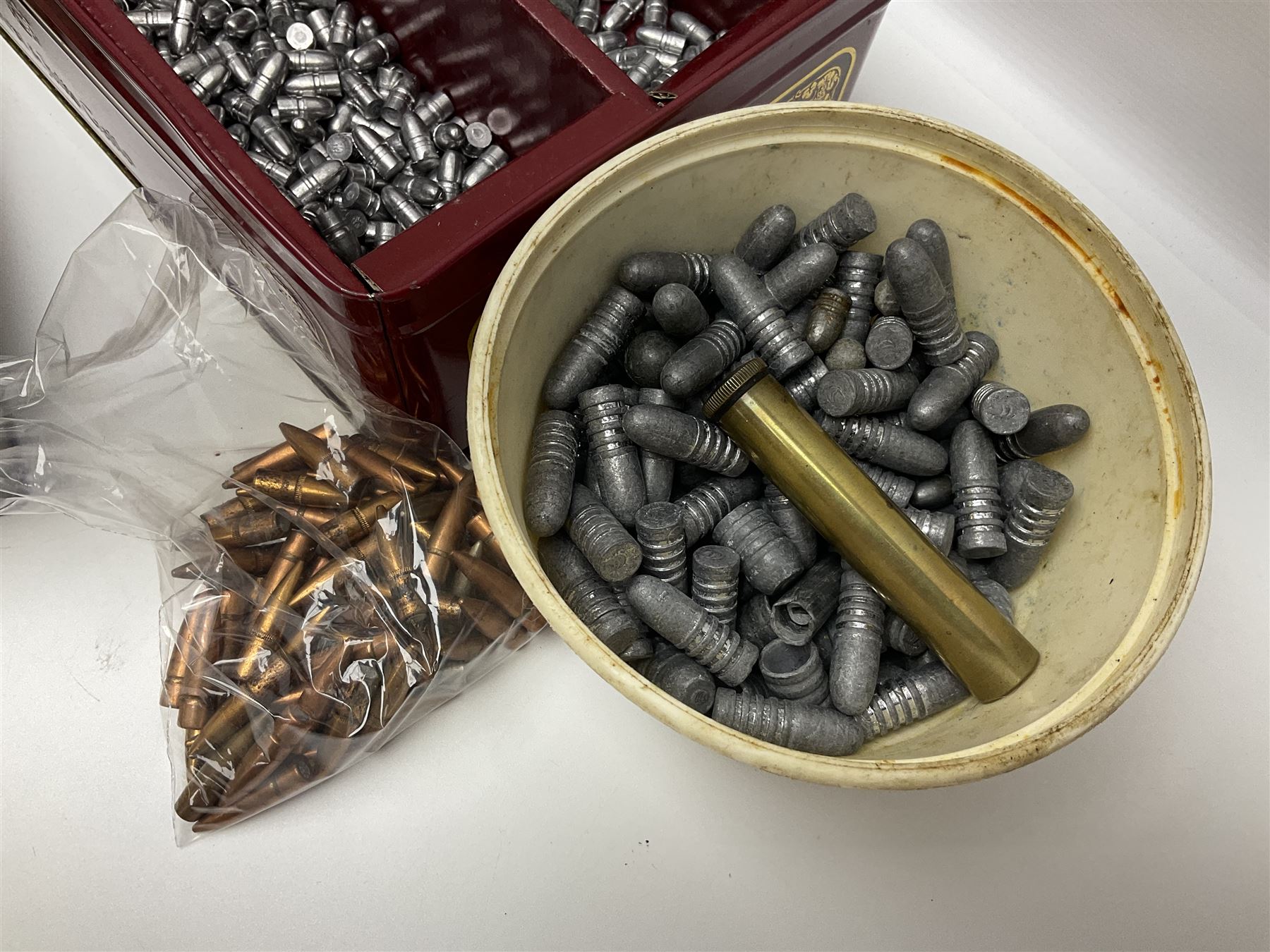 Assorted gun cleaning equipment including .303 brass oil bottle and boxed Webley Cleaning Kit etc; together with quantity of various calibre bullets for reloading 