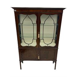 Edwardian mahogany display cabinet, fitted with two glazed doors and two cupboards, two glass shelves