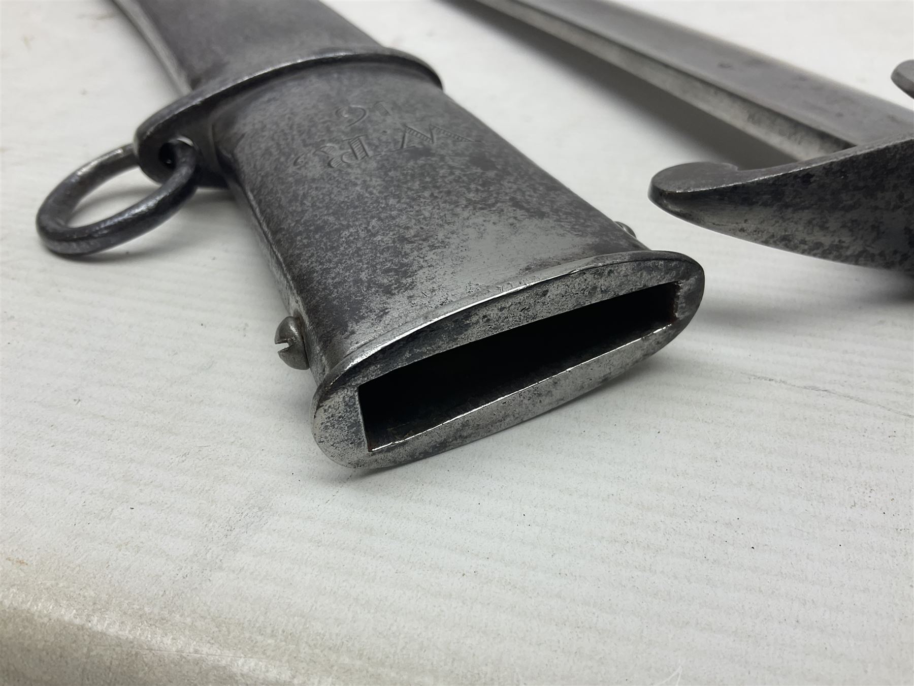 British 1796 Pattern Light Cavalry trooper's sword, the 84cm curving fullered blade stamped Hadley.1 to the back edge, steel hilt with knucklebow, D-shaped langets and leather grip; in polished steel scabbard stamped Osborn & Gunby Birmm. and W.R.16 ( ?16th Light Dragoons) with two suspension rings L100cm overall