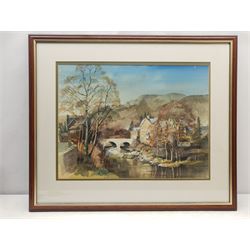 Alan Kirkpatrick (British 1929-): Welsh Village with River, watercolour signed and dated 1992, 39cm x 52cm
