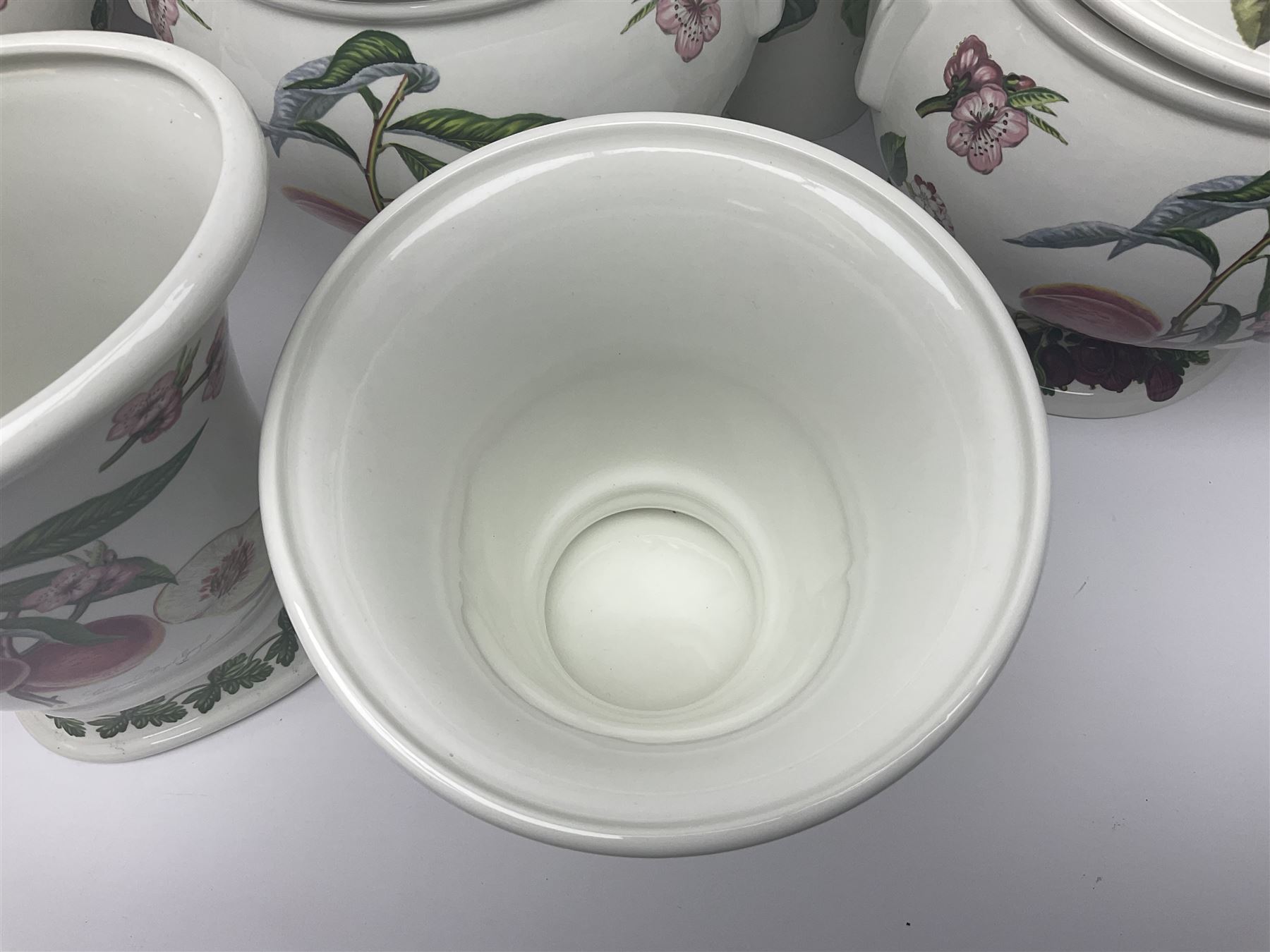 Three Portmeirion soup tureens with covers and ladles, together with vases, large bowls and other Portmeirion items