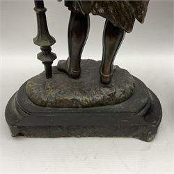 Pair of bronzed figure modelled as a hunter in traditional dress, each holding a pike, H48cm