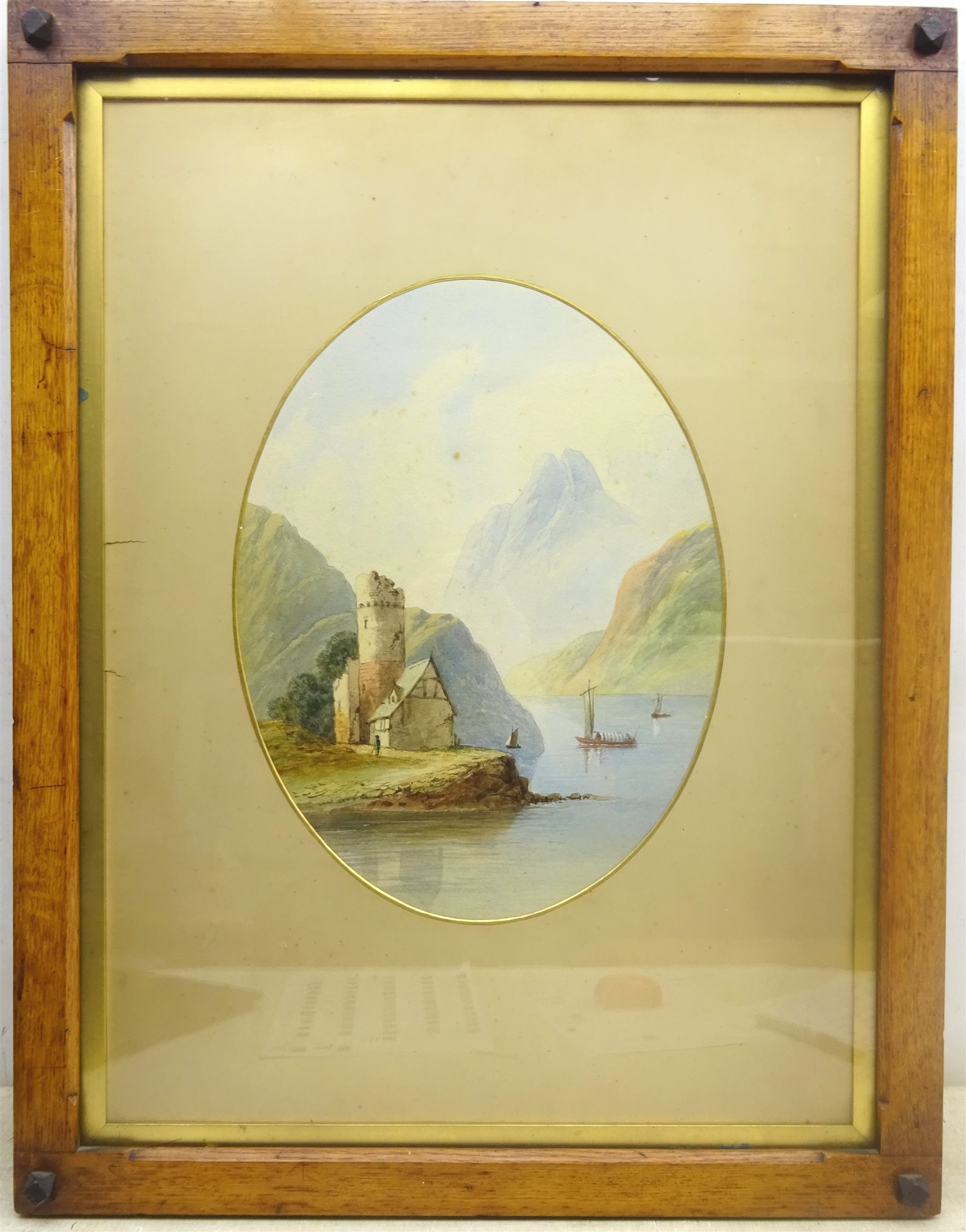 English School (19th century): Mountain lake scene, oval watercolour unsigned 39cm x 29cm in period oak frame