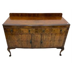 Early 20th century figured walnut bow front sideboard, fitted with two drawers and two cupboards