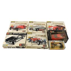 Five Bburago kit built cars and two Bburago diecast models