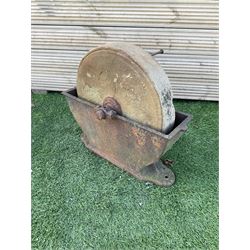 Small stone sharpening wheel, and a shallow cast iron trough - THIS LOT IS TO BE COLLECTED BY APPOINTMENT FROM DUGGLEBY STORAGE, GREAT HILL, EASTFIELD, SCARBOROUGH, YO11 3TX