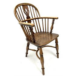 19th century elm low back Windsor armchair, turned supports joined by crinoline stretcher 
