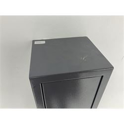 Grey steel wall mounting gun cabinet to accommodate three guns; single door with two locks with two keys for one lock; internally H128.5cm W21cm D17.5cm; externally H129cm W21.5cm D20cm