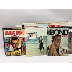 Sixteen James Bond books, including Live and Let Die, The Spy who Loved Me, Four Your Eyes Only, Moonraker etc, together with various 007 ephemera, soundtrack vinyls etc 