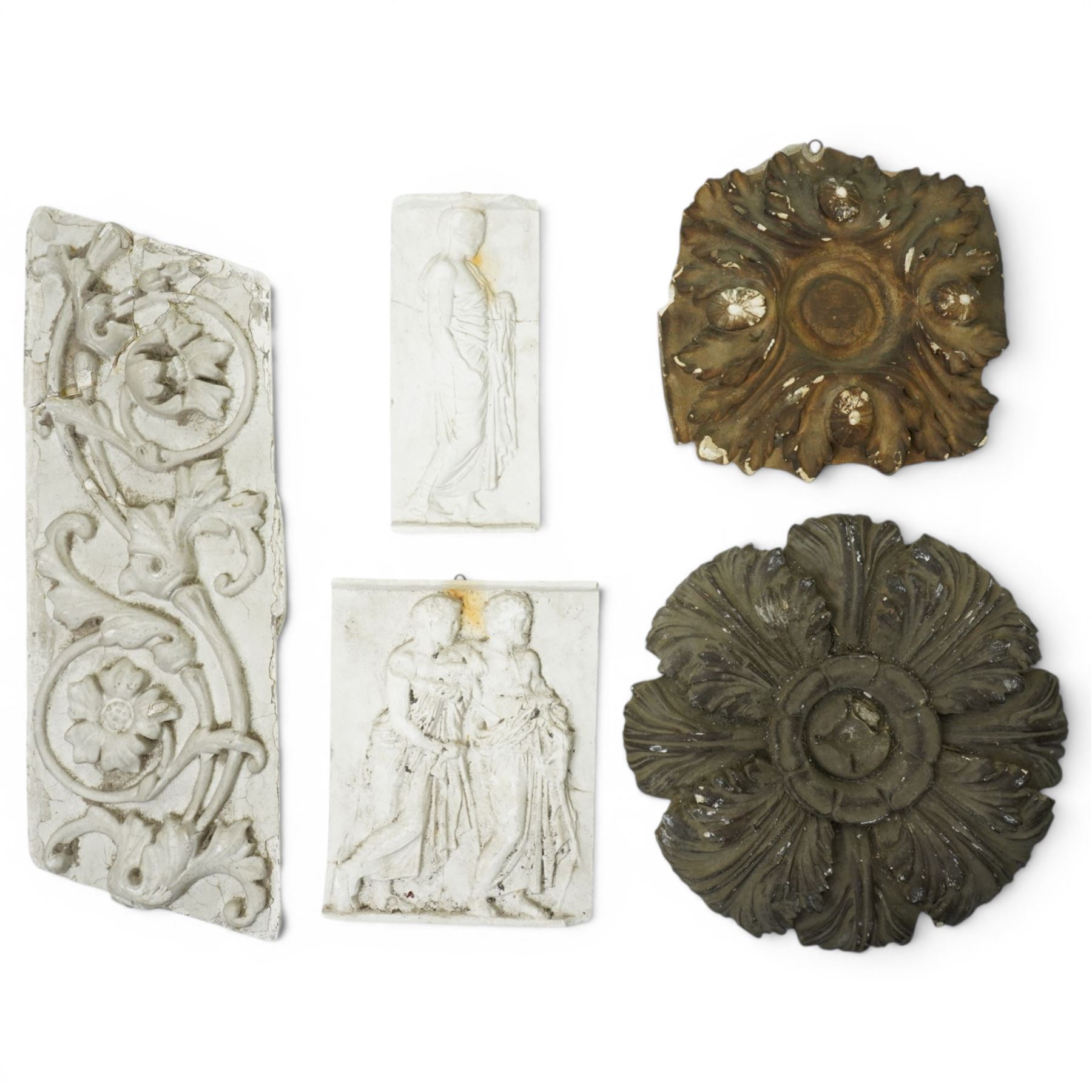 After the Antique - Three relief moulded plaster panels with figures, flowers etc., largest 20cm x 52cm and two ceiling bosses larger 33cm 