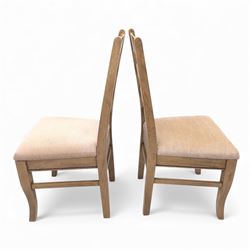 Barker and Stonehouse Flag Stone extending dining table and four matching chairs, the rectangular top with parquetry inlay and contrasting border, extending by central leaf, on slightly curved supports, the chairs with padded upholstered seats and ladder backs (Chairs H 108cm, W 50cm, D 54cm) (Extends to 195cm)