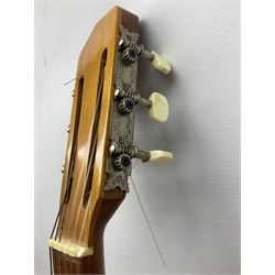 Encore black electric cut-away guitar L96cm; and Spanish Victor Garcia model 187 acoustic guitar, bears label dated 1972 L99cm; each in soft carrying case (2)