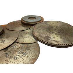 Forty-nine 27cm musical box discs, twenty-three 28cm discs and eight 39.5cm discs; together with seventeen 22cm white metal rings (no spikes)