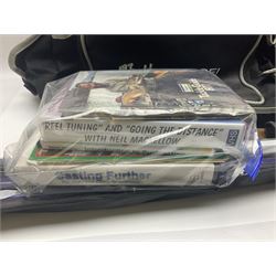 Collection of fishing memorabillia and equipment, including an Allcocks three piece split cane trout fly rod, Shakespeare Salt 3600 surf rod, two tackle bags, Old Red Seastreak multiplier reel, Sportext Saltwater fixed spool reel, fishing dvds, etc