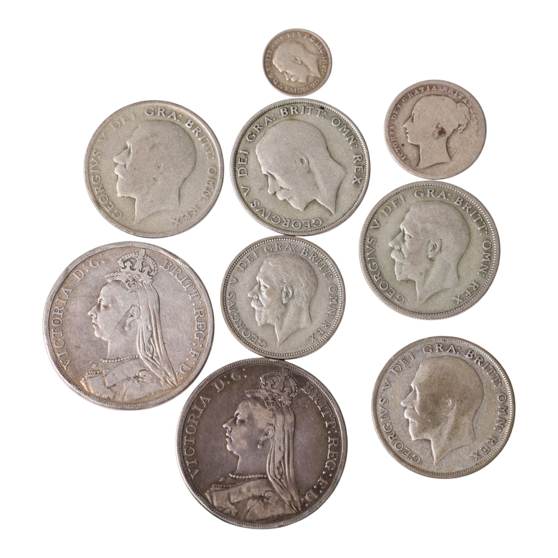 Two Queen Victoria 1889 silver one crown coins, Queen Victoria 1872 one shilling coin, four King George V silver half crown coins, one florin, one shilling, and one threepence (9)