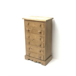 Small pine pedestal chest, six drawers, shaped plinth