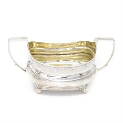 George III silver twin handled open sucrier, of oval form with engraved floral decoration ...