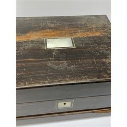 A Victorian coromandel box, with inset mother of pearl panel to the hinger opening cover, mother of pearl escutcheon, and secret drawer beneath, (lacking interior), H17cm L30cm D22.5cm.   