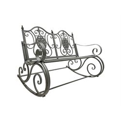 Regency design wrought metal rocking garden two seat, pierced back with scroll design over strap seat, with C-scroll back supports, in antique grey finish
