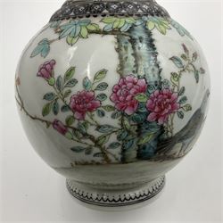 Pair of Chinese Republic porcelain vases, each painted in Famille Rose enamels with pairs of pigeons amidst peony, rock, flowering plants and leafy branches, possibly Qianlong seal beneath, H22cm 