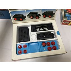 Fischer Technik/Lego/Playmobil - thirteen model building sets comprising eight Fischer Technik sets 50, 50/1, 50v, 50/2, 50+mot1 and two 50S, 50/1 add-on pack, with spare parts packs 01, 03, 05, two 22 and 30; two Lego sets comprising C107 and Lego Systems 103, part-set 870 and 970; Playmobil no.3520 set; four boxes of loose lego, various instruction manuals and a scrapbook 