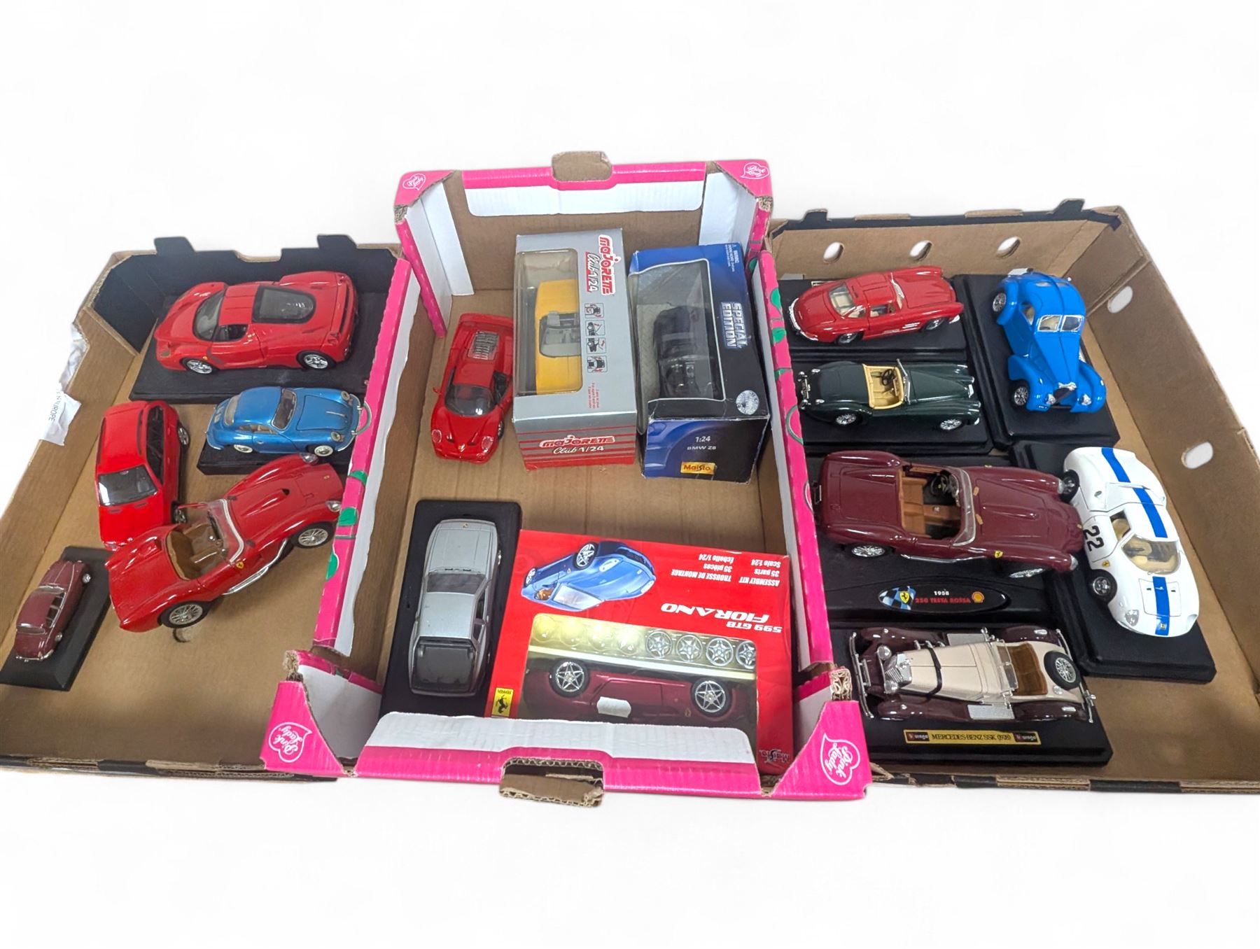 Diecast model vehicles, including Maisto, Majorette and Bburago examples, three boxed the rest loose, different scales, in three boxes