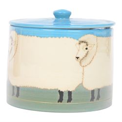 Dennis Chinaworks jar and cover, the body decorated with sheep, with a blue lid, impressed and painted marks beneath, H10cm