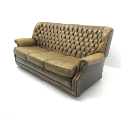 Pegasus three seat sofa upholstered in deeply buttoned antique brown leather, W185cm