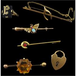 Early 20th century gold opal and stone set bug brooch, gold citrine brooch and two others, gold onyx signet ring with applied initial, all 9ct, and a gold heart locket clasp, stamped 15c