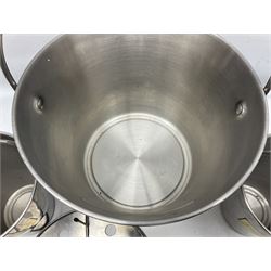 Stainless steel Laurent-Perrier champagne bucket, with engraved brass plaque and grip to swing handle, together with two matching smaller, largest D38cm (3)