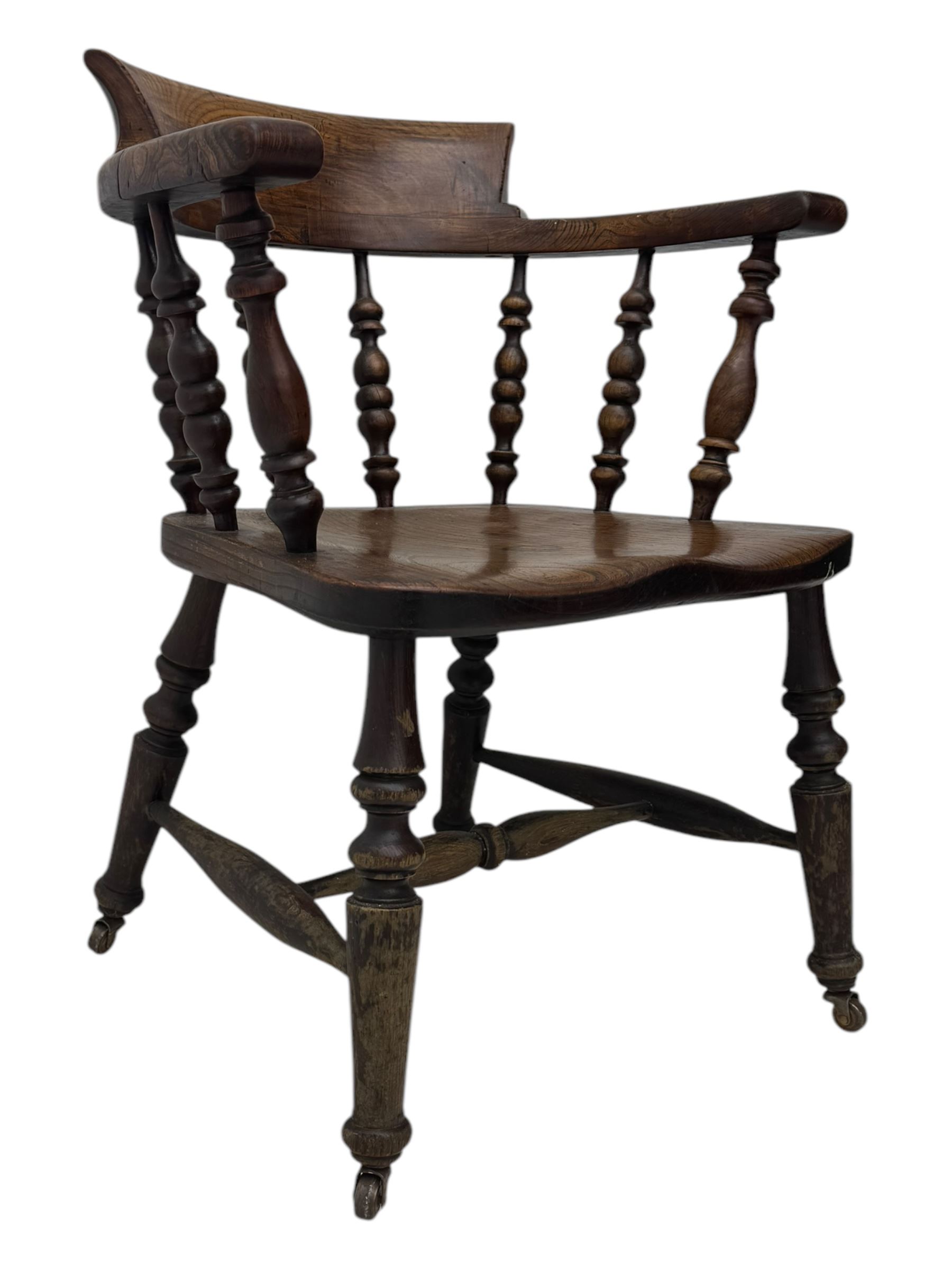 Victorian elm captains smokers bow chair, spindle turned tub shaped back, saddle seat, seat height 41cm