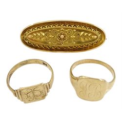 Edwardian 15ct gold oval brooch, with applied foliate decoration, stamped 15ct and two 9ct gold signet rings