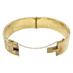 9ct gold hinged bangle with bright cut decoration by Henry Griffith & Sons Ltd, Birmingham