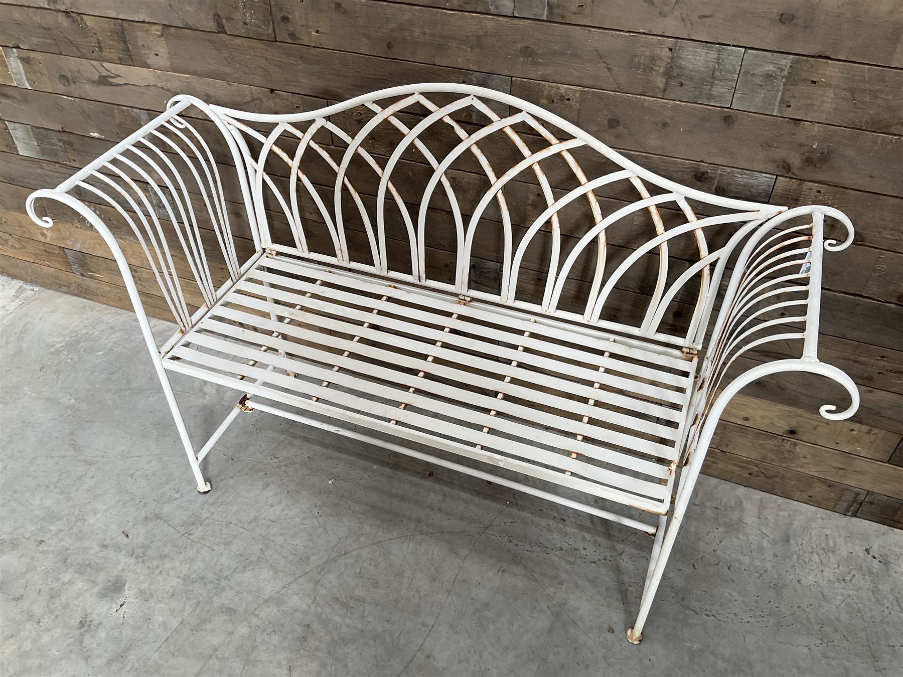 Two seat cream painted metal garden bench