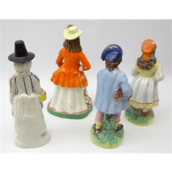  Four 19th century Staffordshire figures: Jenny Jones, H31.5cm, Lady with walking cane and hat, H32.5cm and lady & gent collecting flowers (3) Provenance: From a Private Yorkshire Collector  