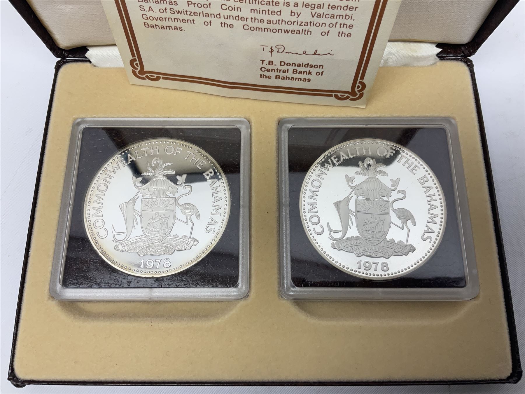 Six Commonwealth of the Bahamas Islands nine coin sets, dated 1972, 1973, 1974, 1975, 1976 and 1979, all minted at the Franklin Mint and containing high denomination silver coins, all cased, and a Bahamas Anniversary 1978 two coin set comprised of two silver proof ten dollar coins, cased 