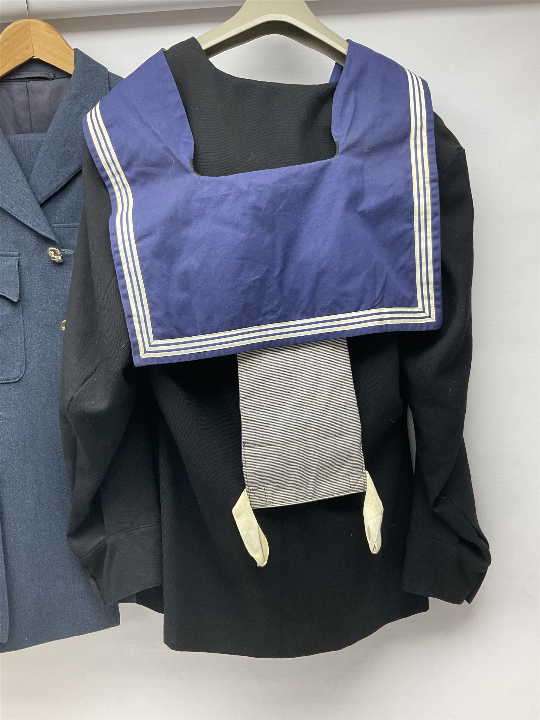 Five military uniforms comprising German Wachbataillon tunic, RASC No.2 dress tunic dated 1963, RAF tunic and trousers dated 1974, RE No.1 tunic and RN Seamans jumper Class II (5)