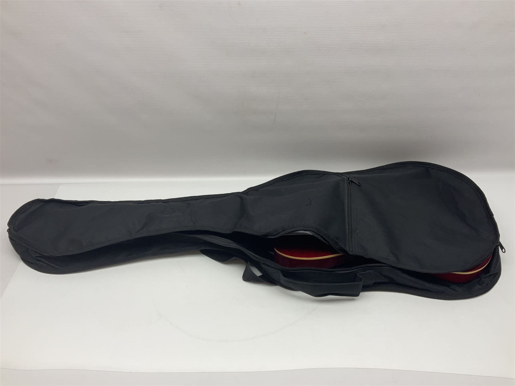 Maverick HSH rock guitar with Floyd Rose tremolo, L100cm overall; in soft carrying case.