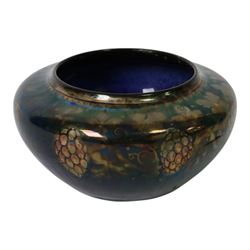 Richard Joyce for Pilkington, Royal Lancastrian lustre vase, of squat form, decorated with grapes and vine leaves, with impressed marks beneath, H9cm